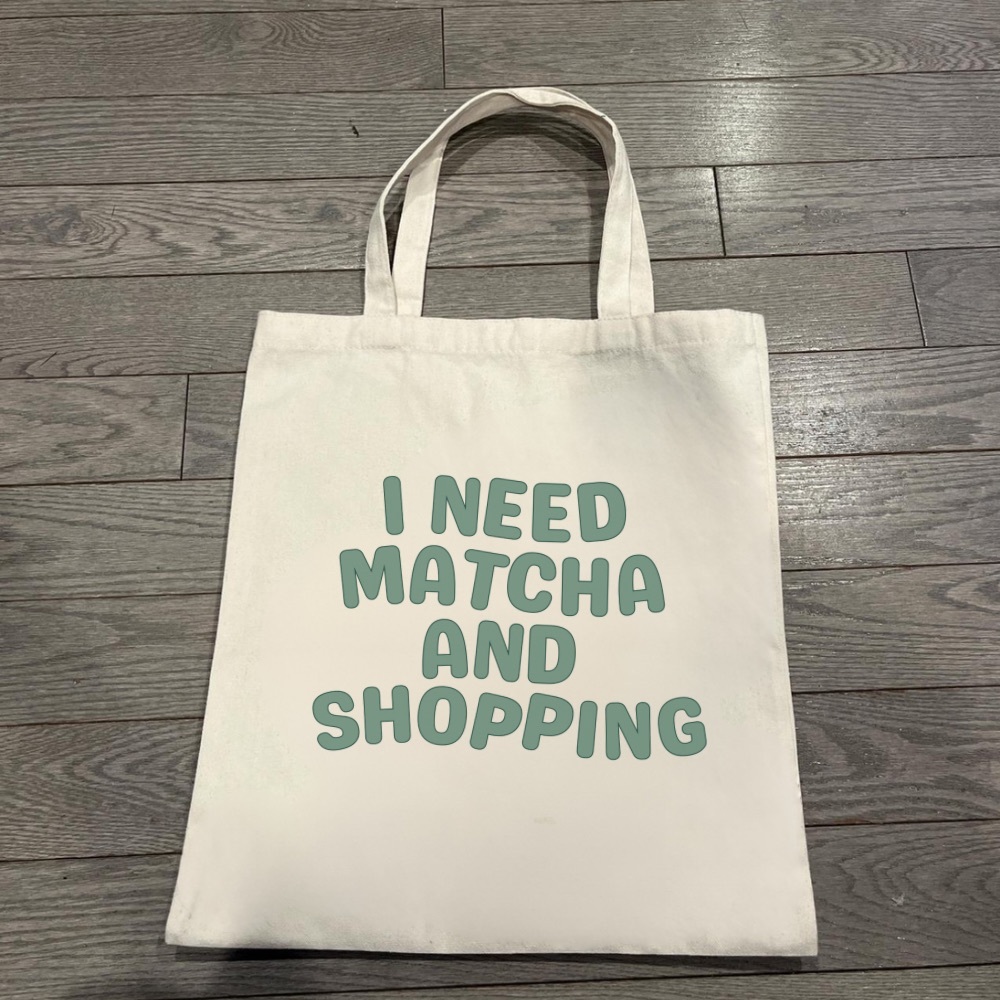 Trendy Cream Tote with Green Text